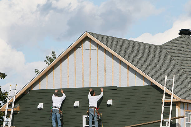 Professional Siding Replacement technician working in Kings Park, VA